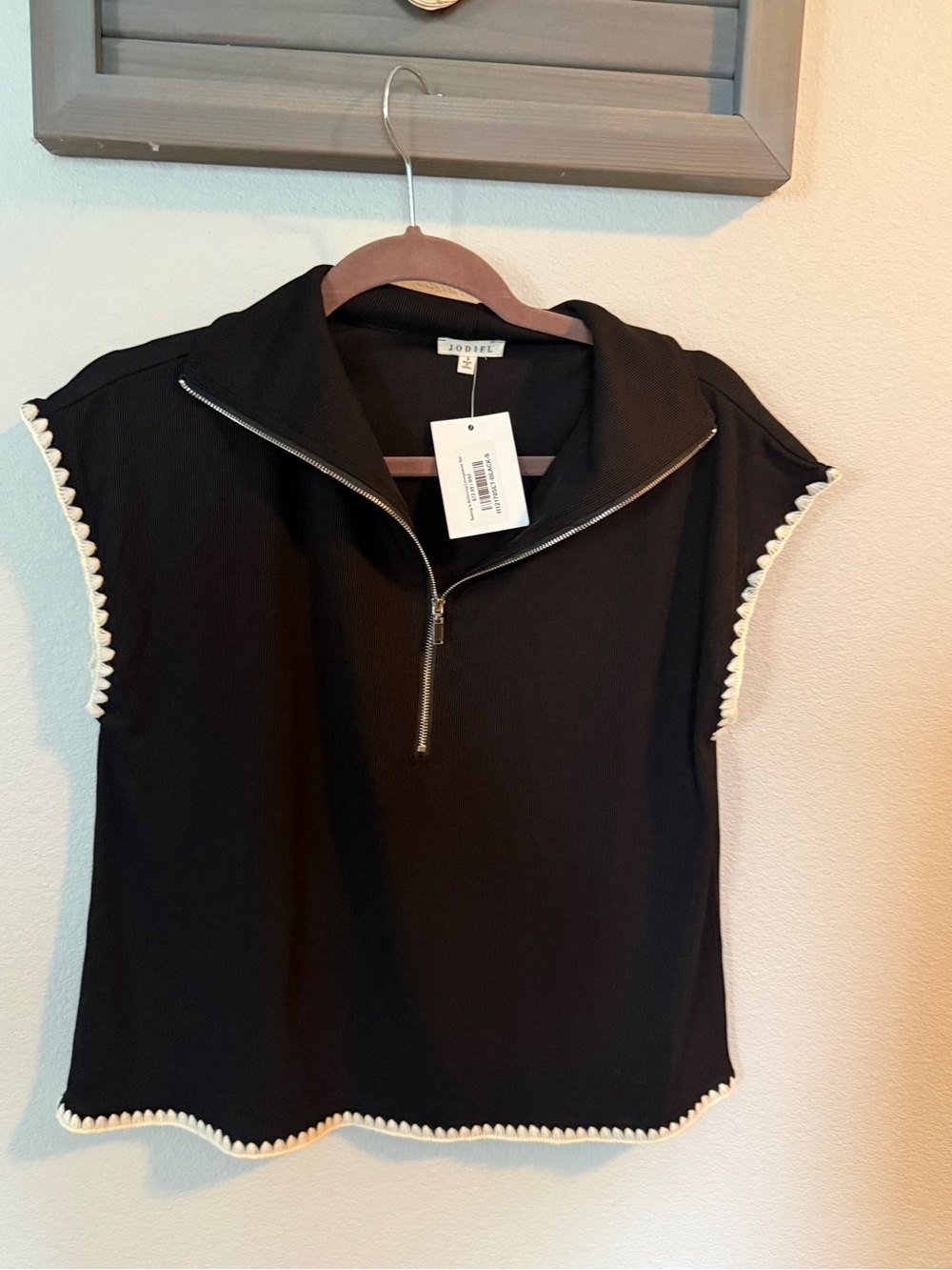 JODIFL Black Sleeveless Zip Polo Top with White Scalloped Trim